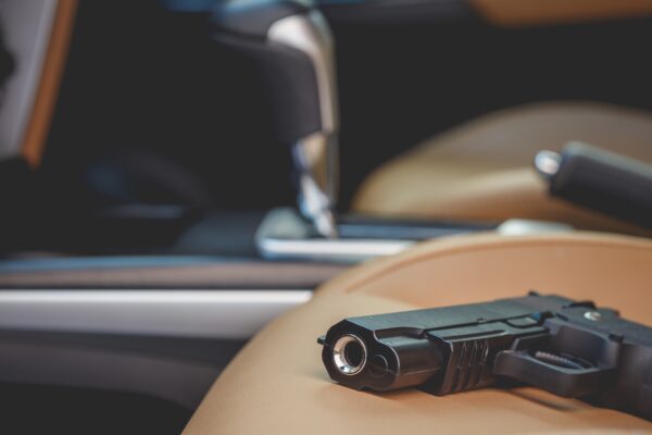 handgun on a car seat