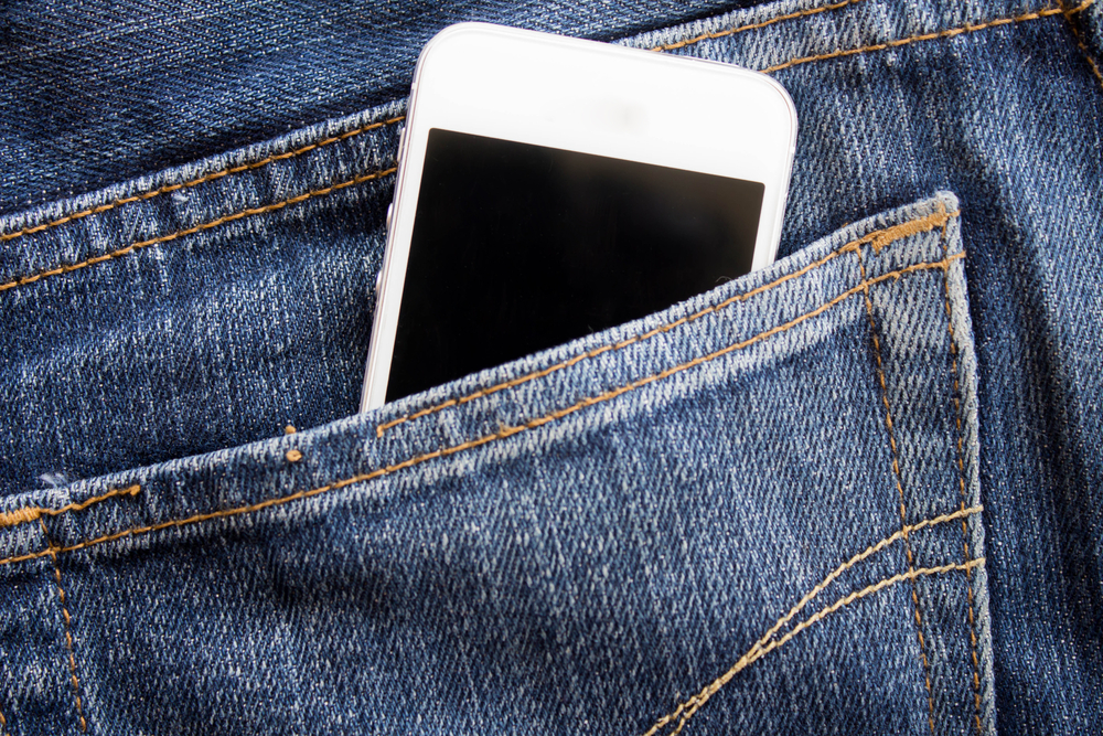 cell phone in back pocket of jeans